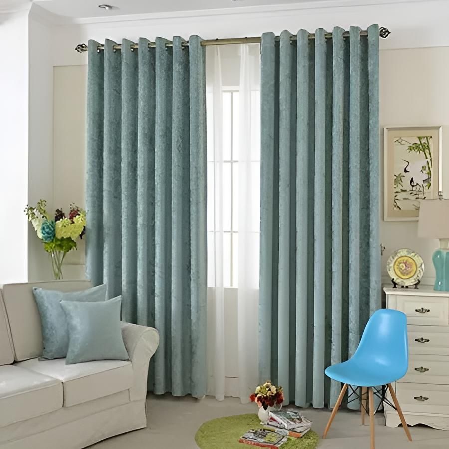 A Living Room With a Couch , Chair and Curtains — Lismore Curtains & Blinds In Lismore, NSW