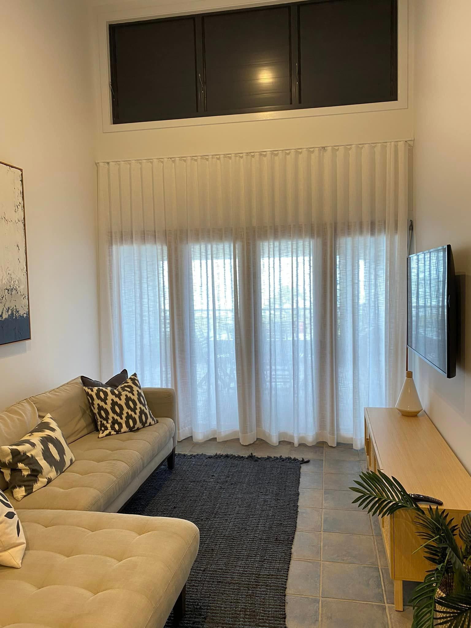 White Curtains In The Living Room