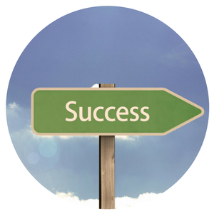 A green sign with the word success on it