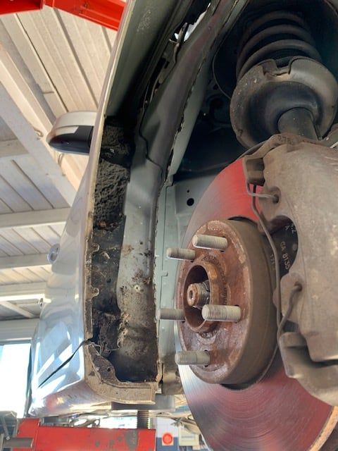 Damaged Car Front Panel, Wheel and Brake — Pelican Motors Service Centre in Caloundra West, QLD