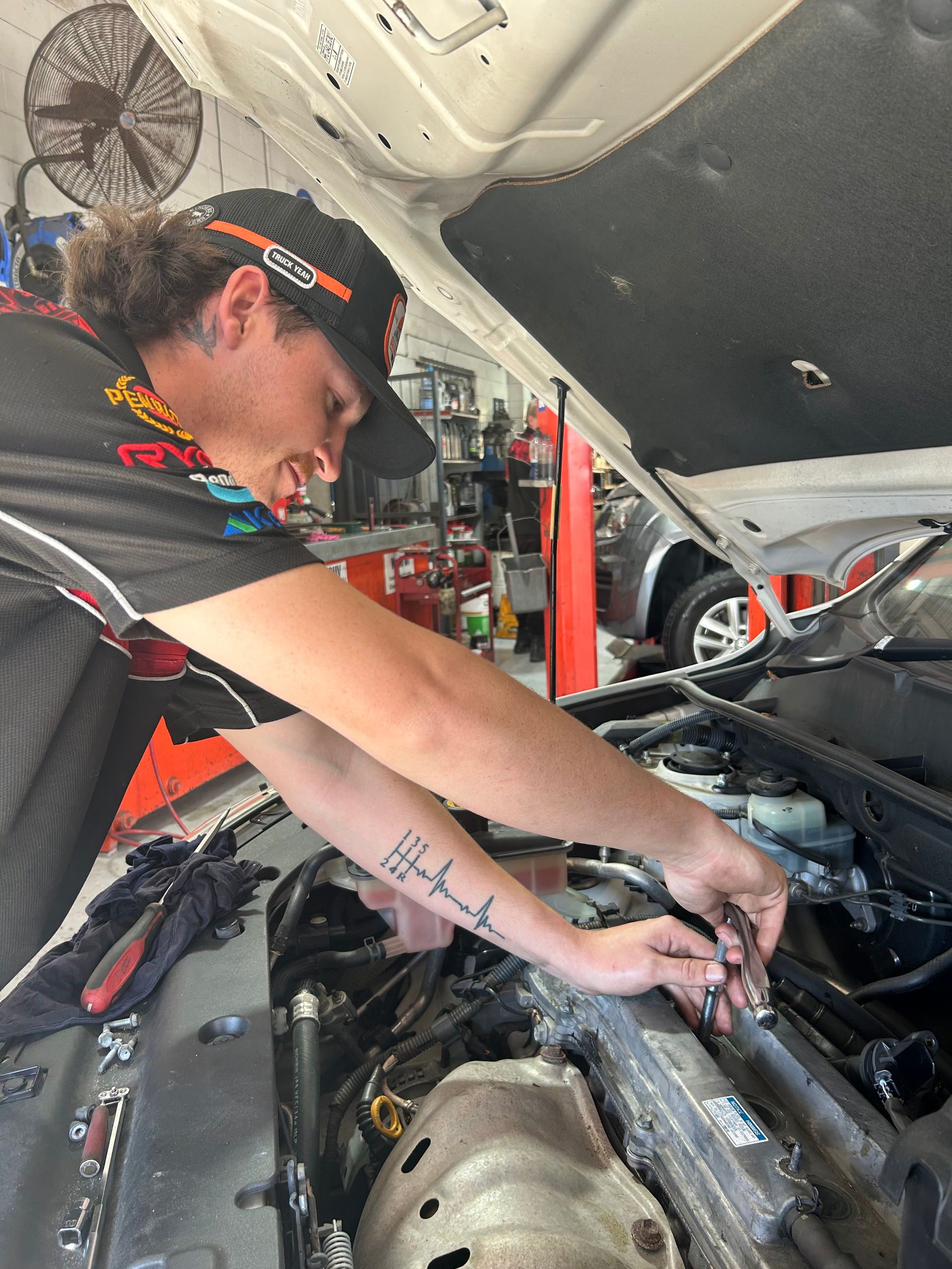 A Close Up of a Car Engine With Gauges Attached to It — Pelican Motors Service Centre In Caloundra West, QLD