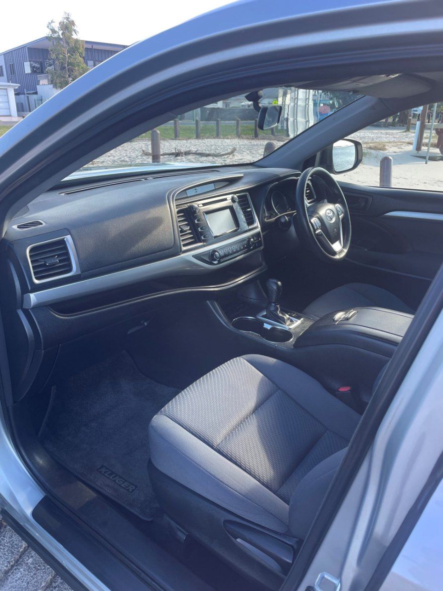 The Inside of a Silver Car With the Door Open โ Pelican Motors Service Centre In Caloundra West, QLD