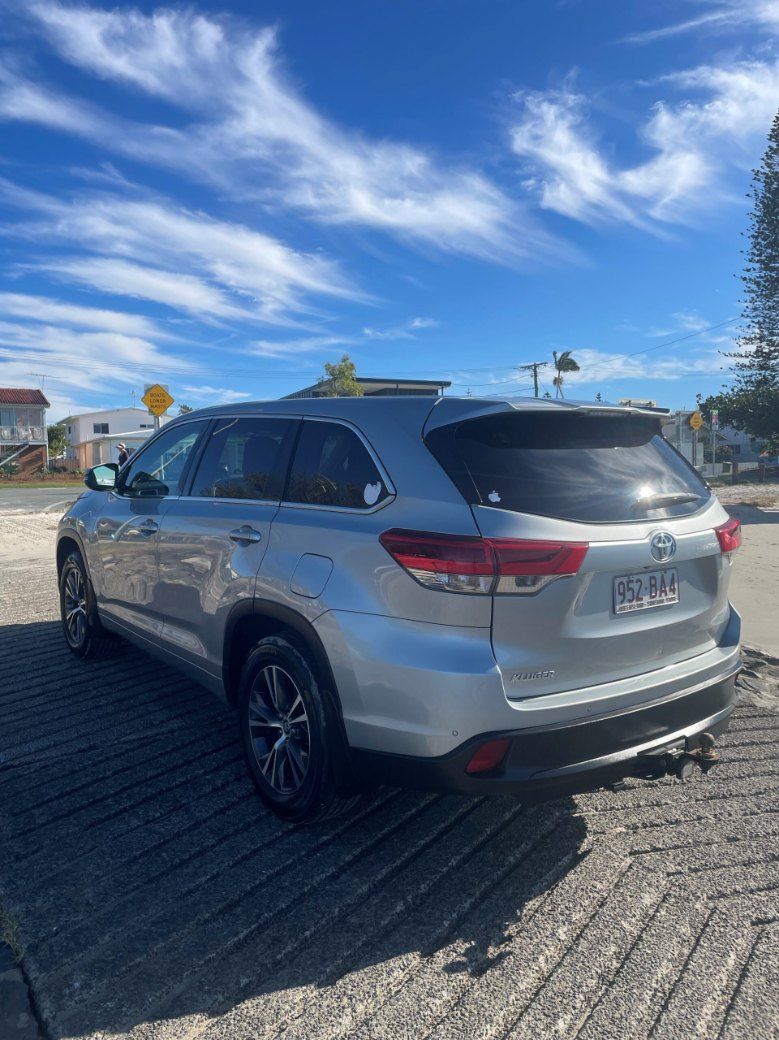 A Silver Suv is Parked in a Parking Lot on a Sunny Day โ Pelican Motors Service Centre In Caloundra West, QLD
