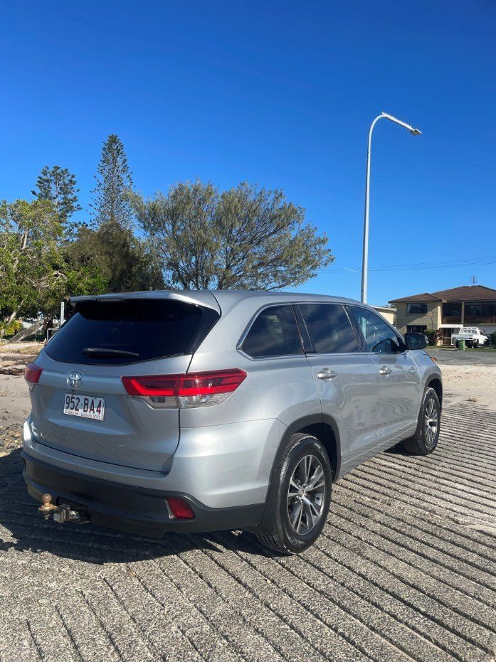 A Silver Highlander is Parked in a Parking Lot โ Pelican Motors Service Centre In Caloundra West, QLD