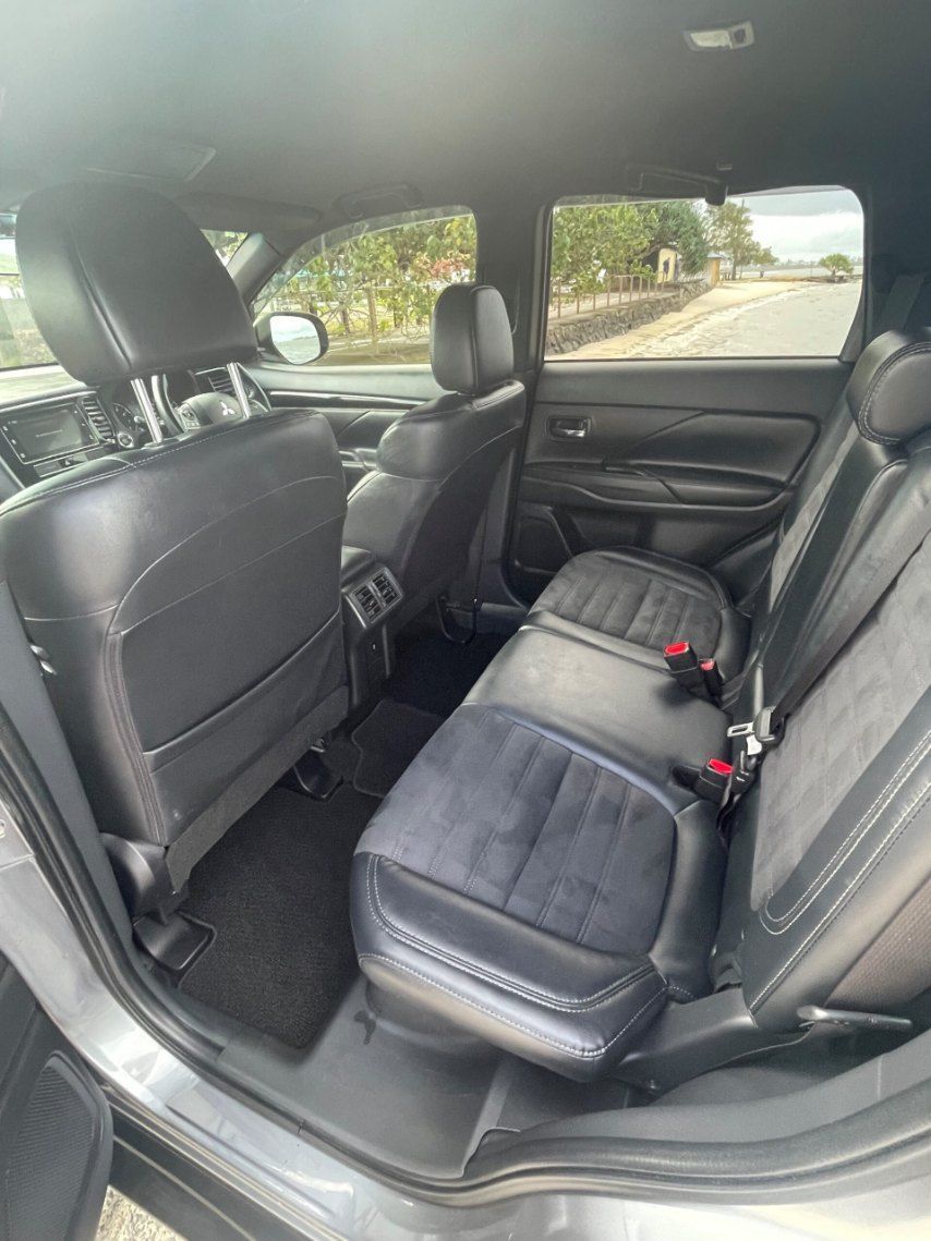 The Back Seat of a Gray Car With Black Seats — Pelican Motors Service Centre In Caloundra West, QLD