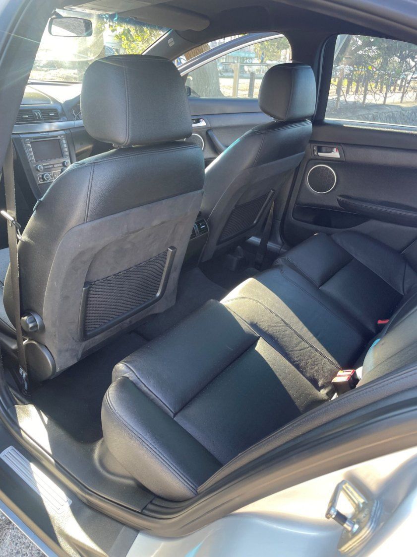 The Back Seat of a Silver Car With Black Leather Seats β Pelican Motors Service Centre In Caloundra West, QLD