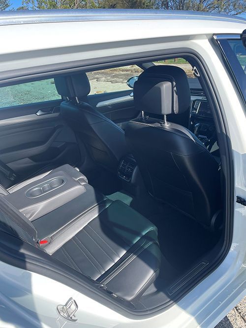 The Back Seat of a White Car With the Door Open โ Pelican Motors Service Centre In Caloundra West, QLD