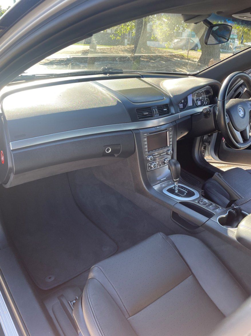 The Interior of a Car With a Steering Wheel and Dashboard β Pelican Motors Service Centre In Caloundra West, QLD