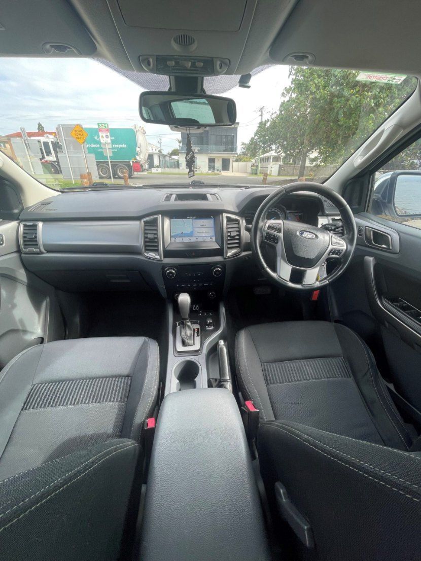 The Inside of a Car With a Steering Wheel and a Dashboard β Pelican Motors Service Centre In Caloundra West, QLD
