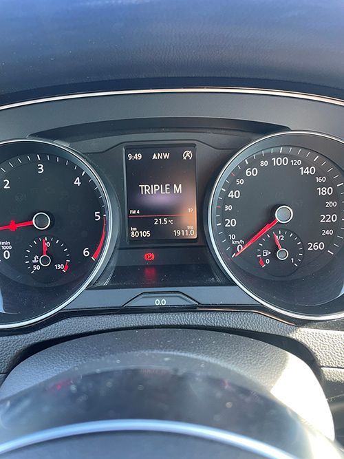 A Close Up of a Car Dashboard With a Screen That Says Triple M on It โ Pelican Motors Service Centre In Caloundra West, QLD