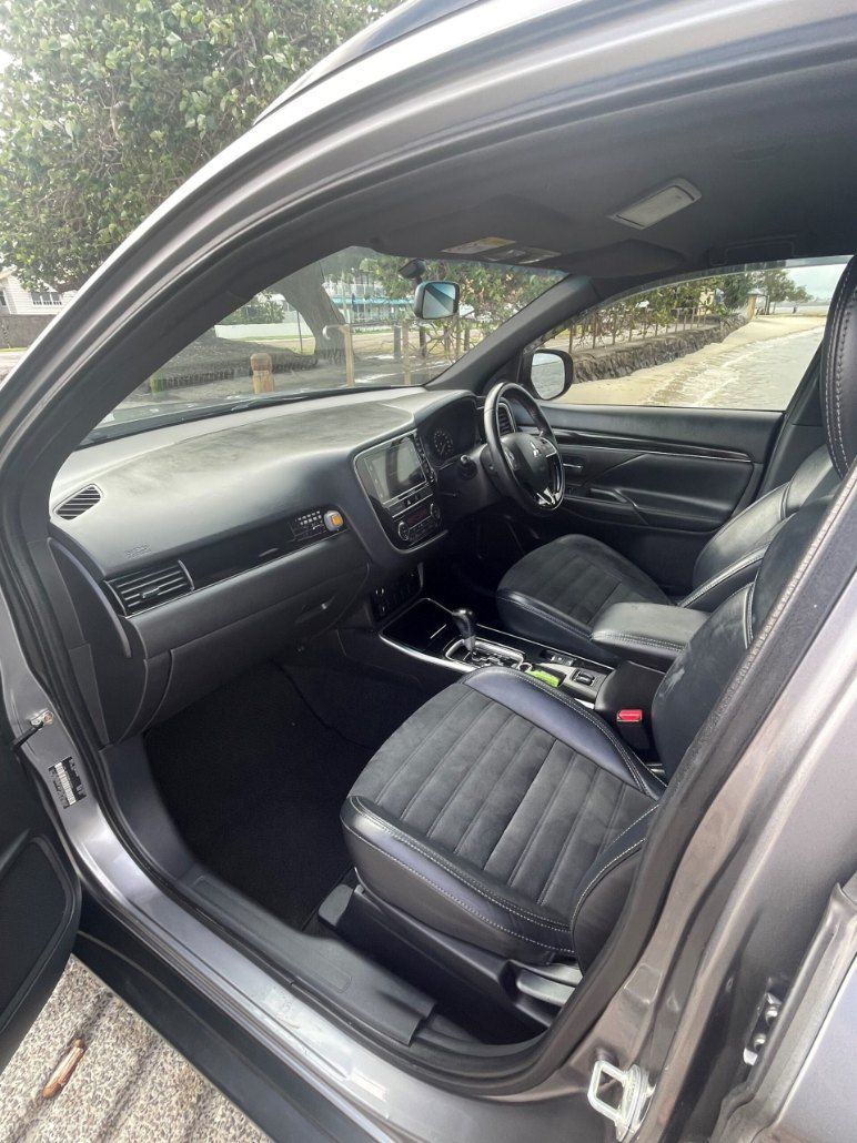 The Inside of a Car With the Door Open and the Seats Up — Pelican Motors Service Centre In Caloundra West, QLD
