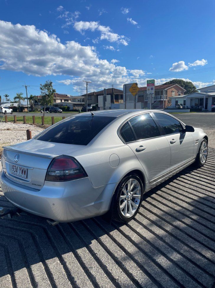 A White Car is Parked in a Parking Lot on a Sunny Day β Pelican Motors Service Centre In Caloundra West, QLD