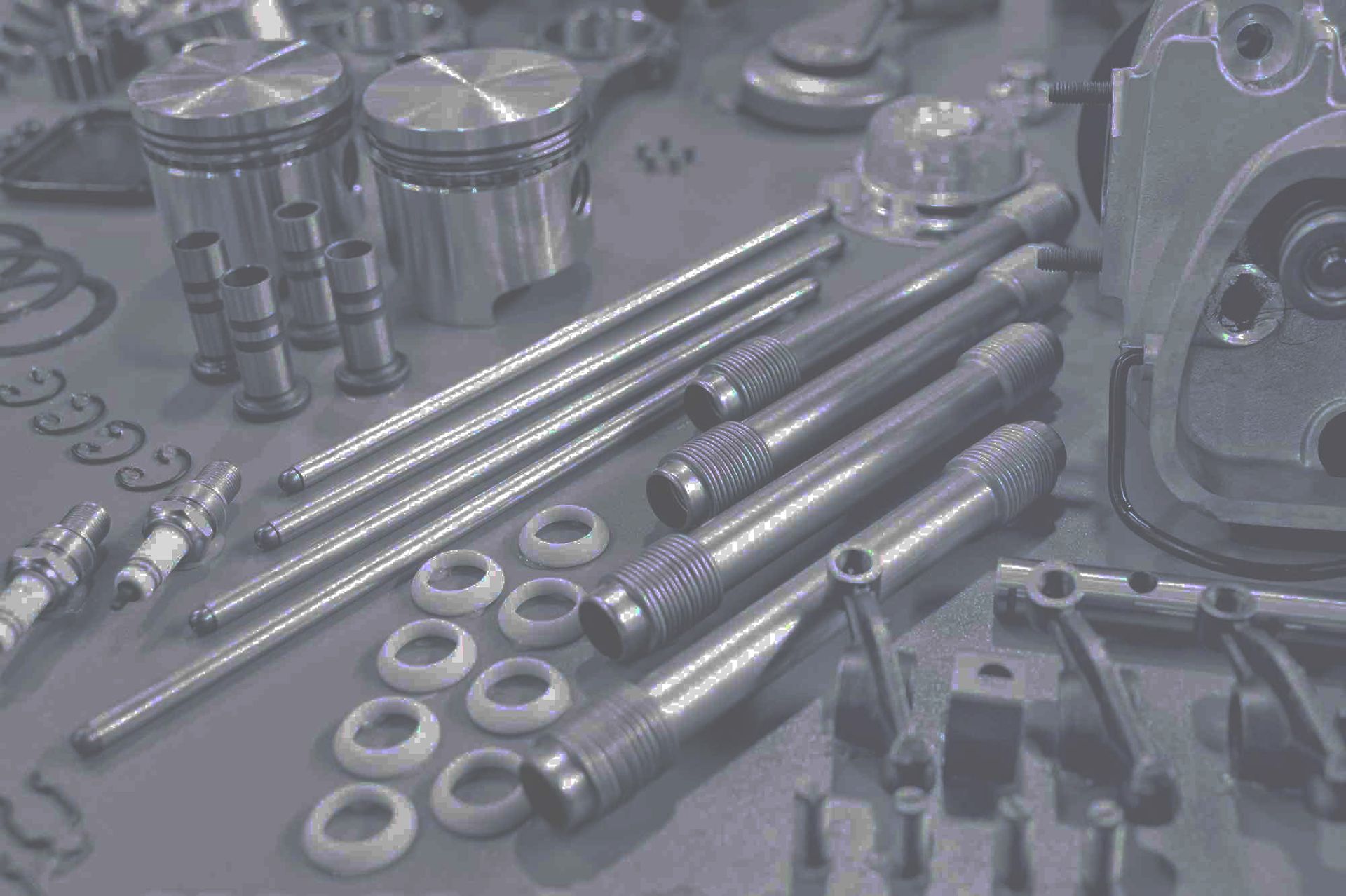 There Are Many Different Types of Metal Parts on the Table — Pelican Motors Service Centre In Caloundra West, QLD 