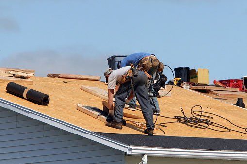 Worker Installing Roof — Lakeport, CA — Lucerne Roofing & Supply Corp