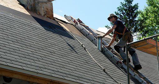 Man Installing Flat Roof — Lakeport, CA — Lucerne Roofing & Supply Corp