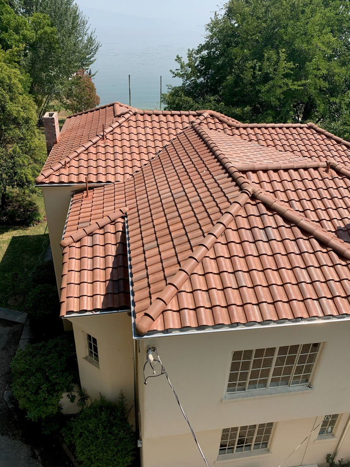 Man Replacing Roof Tile — Lakeport, CA — Lucerne Roofing & Supply Corp