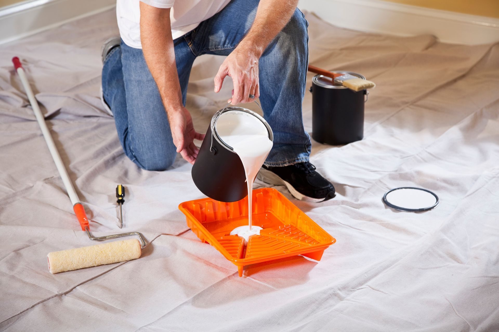 Pouring Paint — Anchorage, AK — Alaska Painting & Construction LLC
