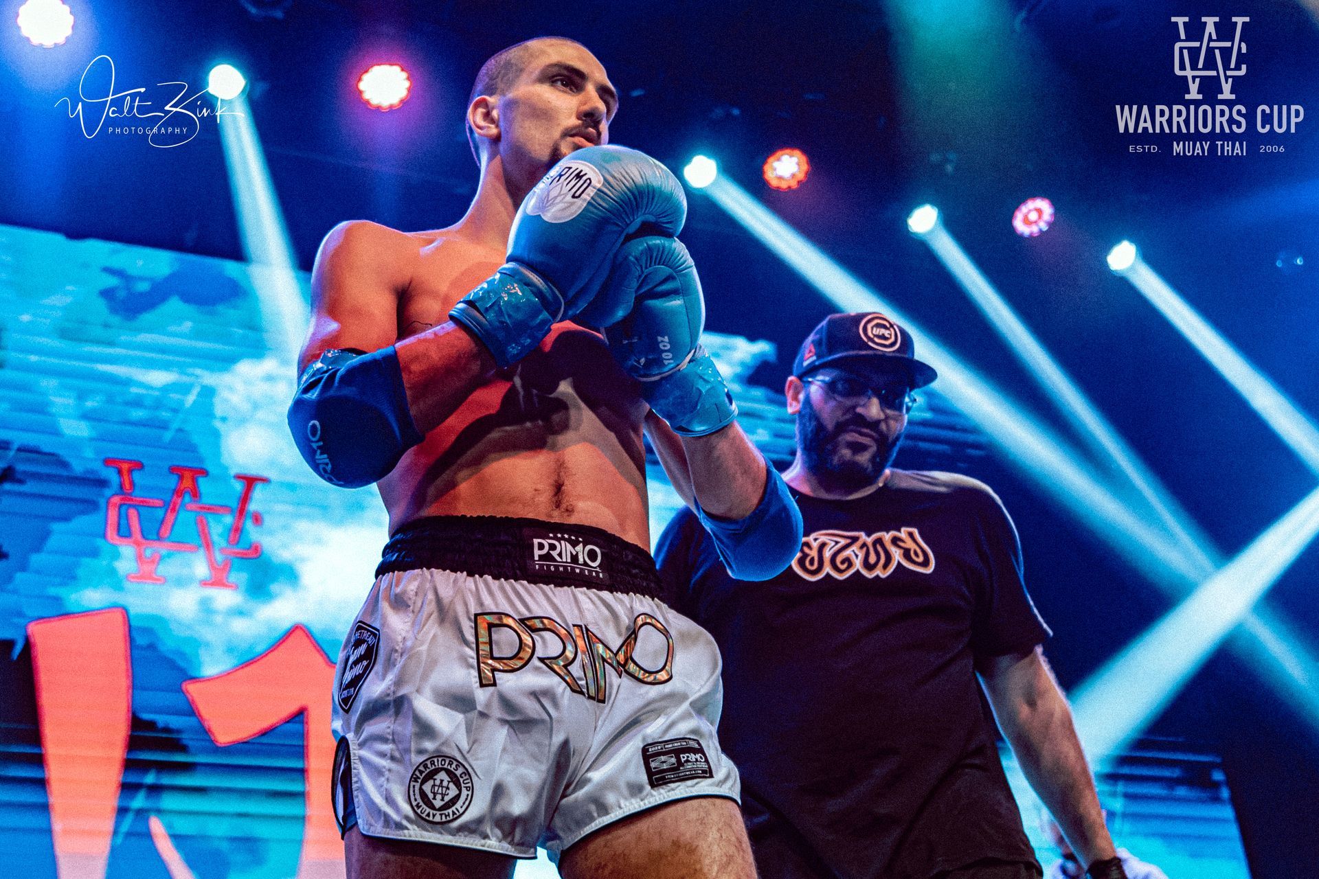 UFC Coach Amr Ibrahim coaching a fighter mid-session