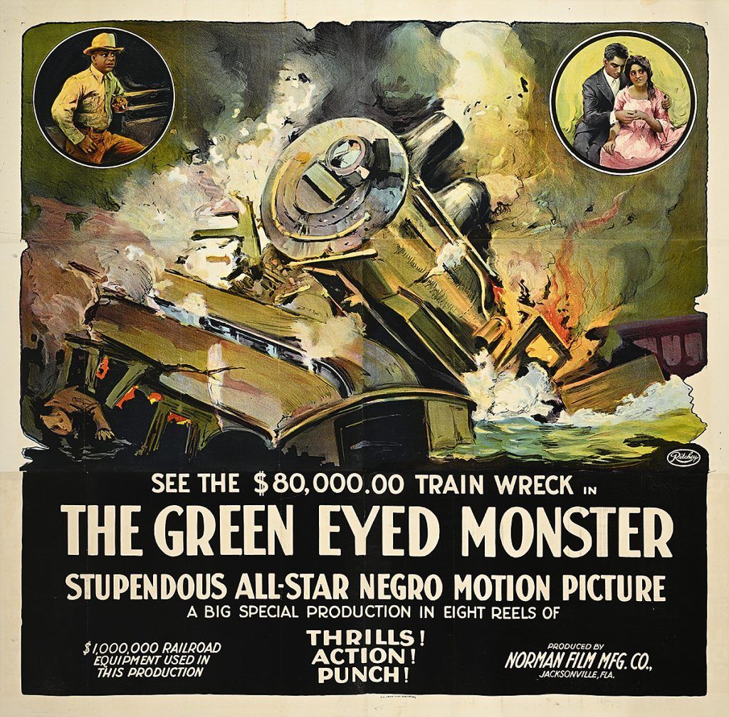 Vintage poster of a train wreck with smoke and flames; text reads “The Green Eyed Monster.”