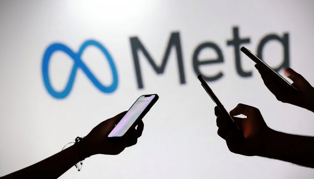 Silhouetted hands holding smartphones in front of a Meta logo on a white background
