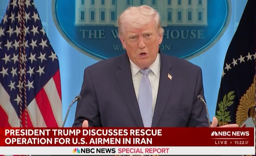President Trump speaking at a White House podium with U.S. and presidential flags behind him.