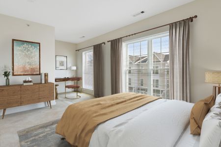 Gradient apartment bedroom with oversized windows.