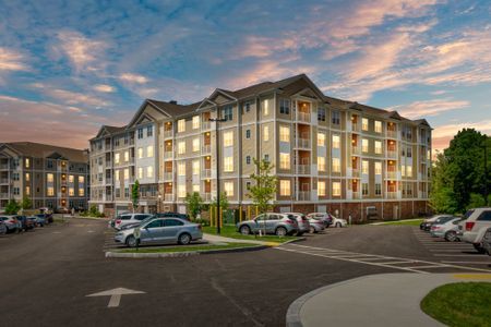 Gradient apartment building exterior view with beautiful sunset. 