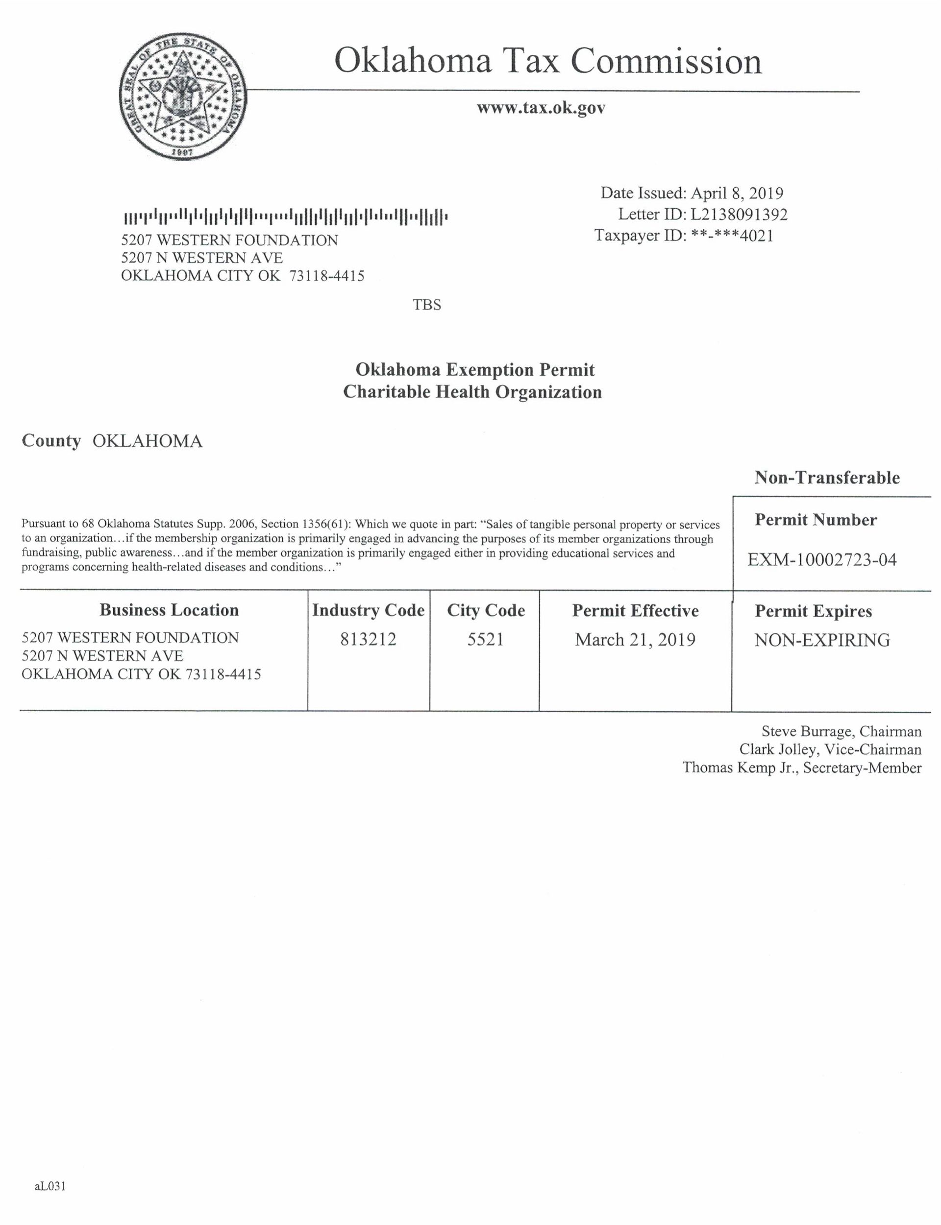 Blurry black-and-white scanned official document with a seal, header text, and table of details.
