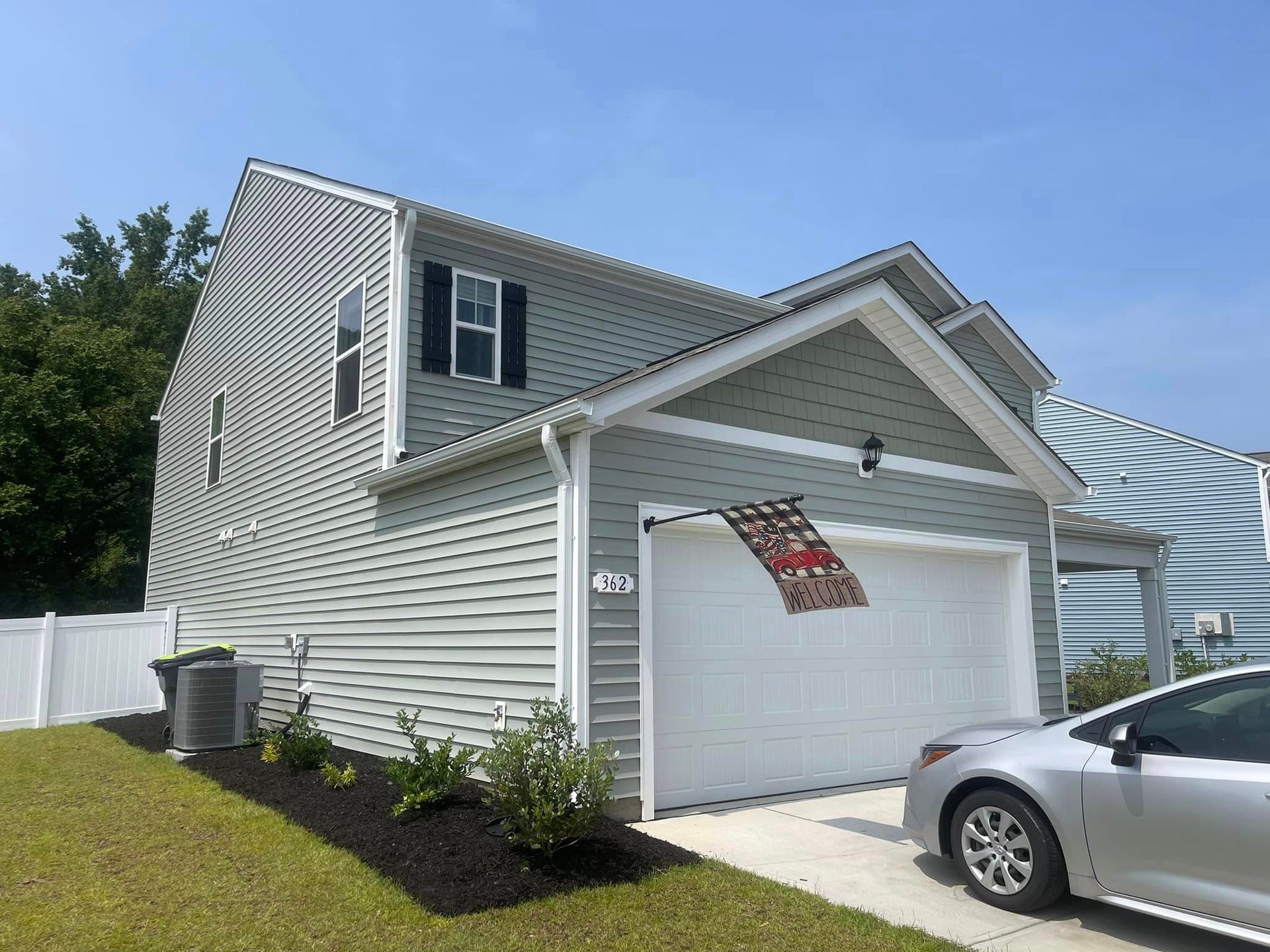 a house that has gutter guard leaf blocking installed in the gutters by SNL Seamless Gutters