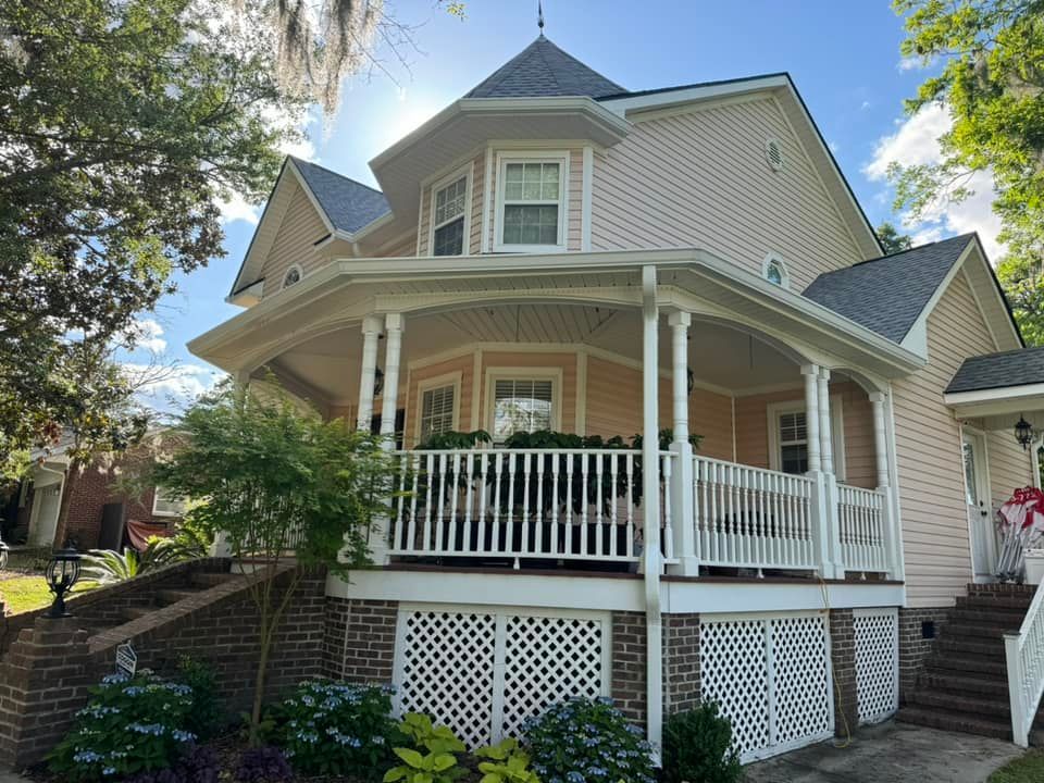 A small house with a white gutter in Coastal Carolina.