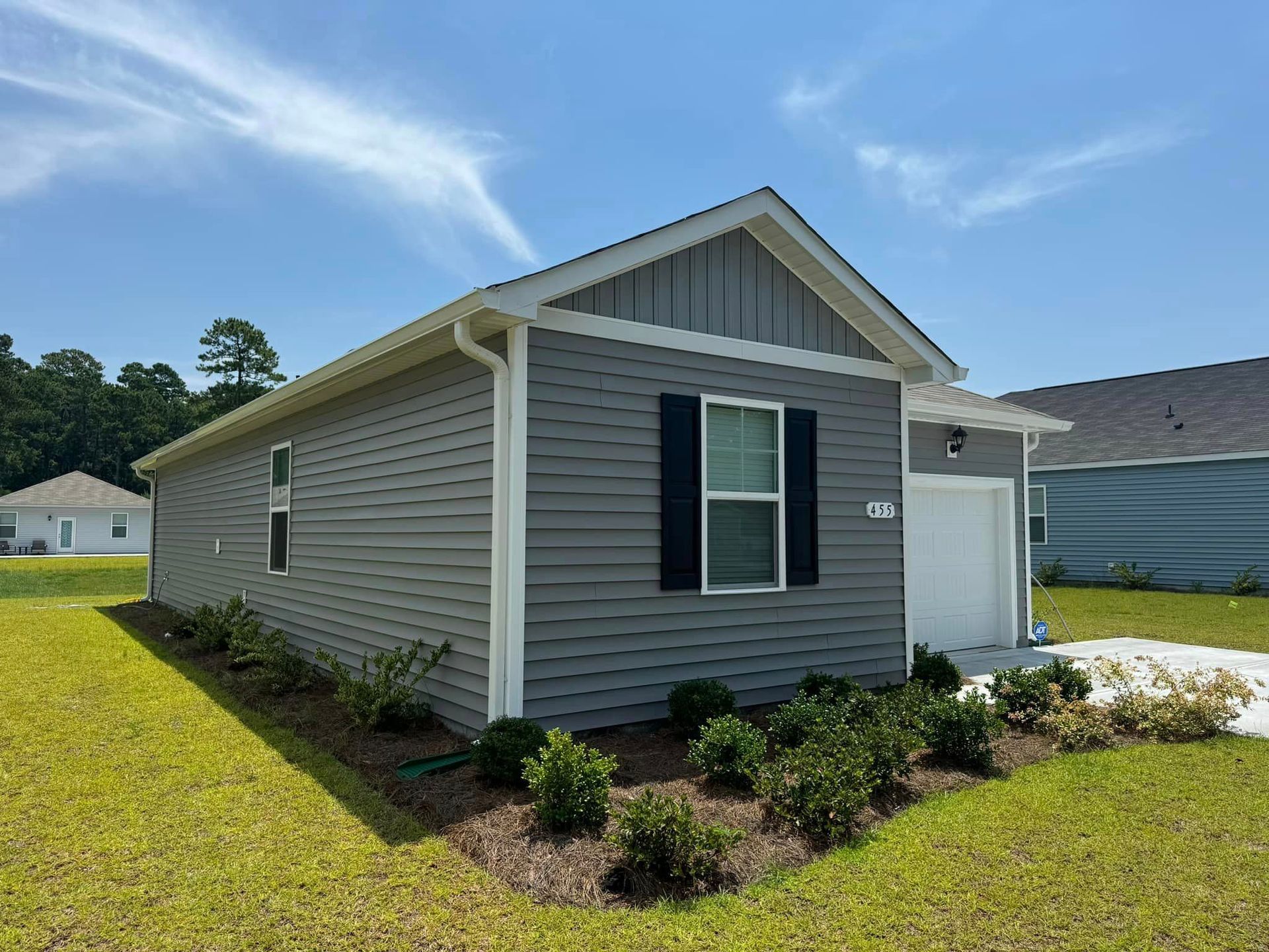A small house with a white gutter leaf guard in Galivants Ferry.