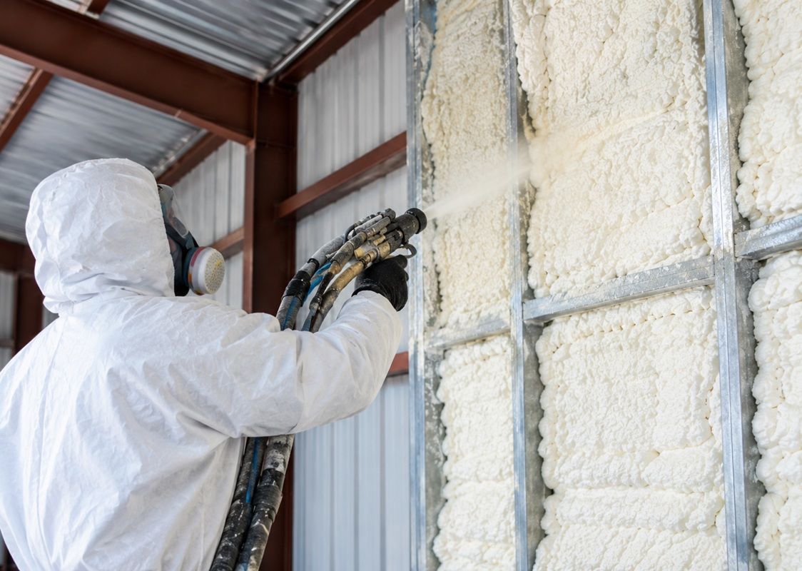 Close-up of metal building spray foam insulation