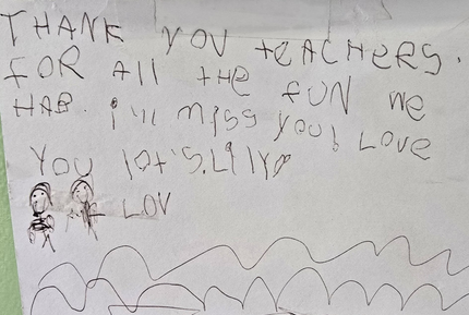 Child’s handwritten note saying “Thank you teachers” and “I’ll miss you,” with small drawings and hearts