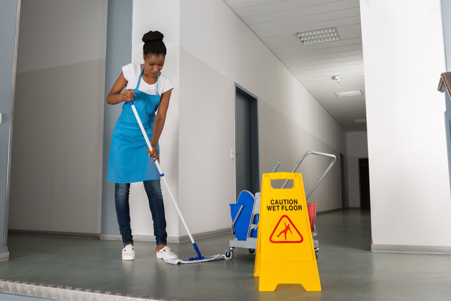Home Painter Wiping Floor | St. Louis, MO | PrettyNPaint