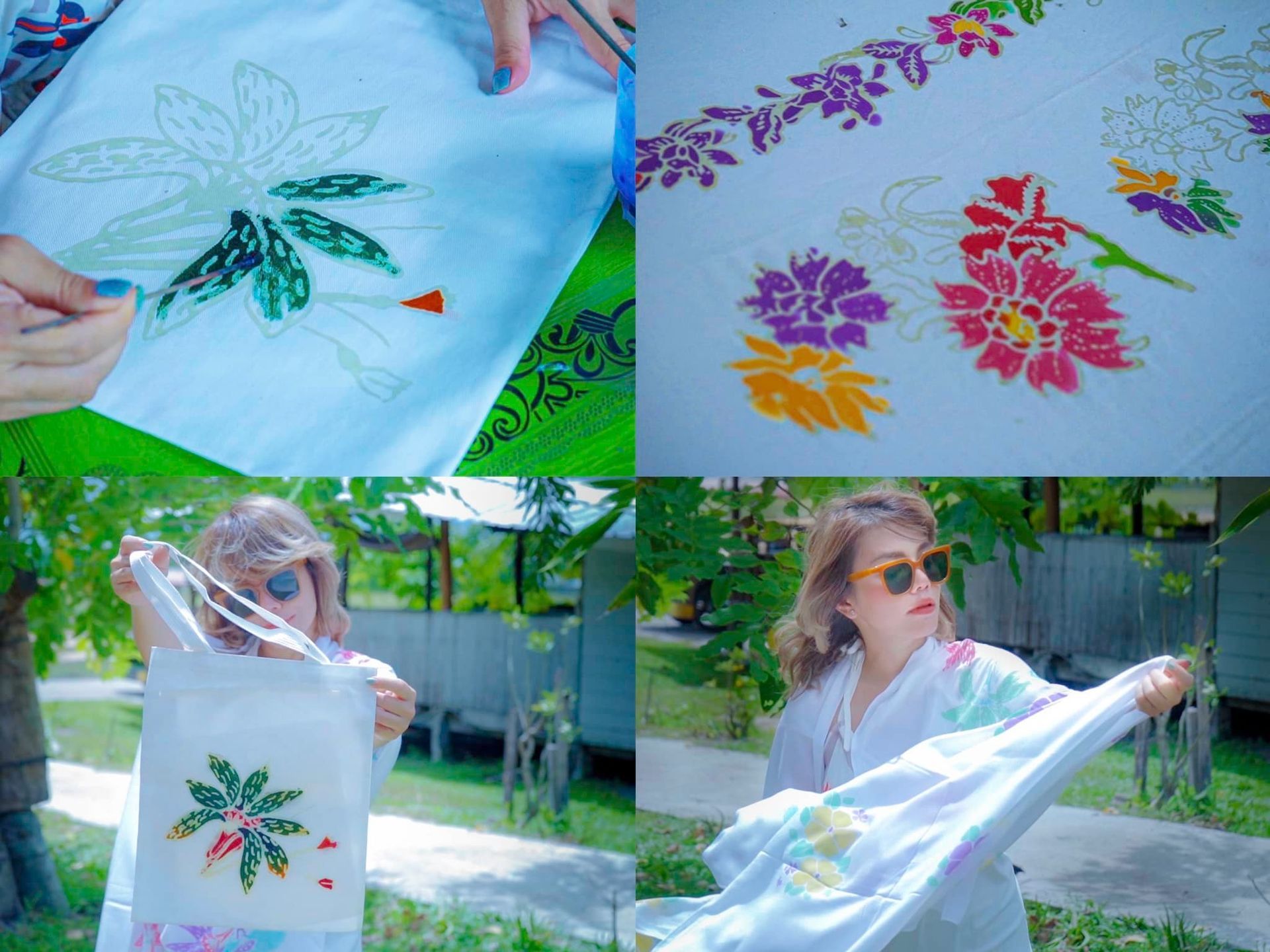 A woman is holding a piece of fabric with flowers on it.