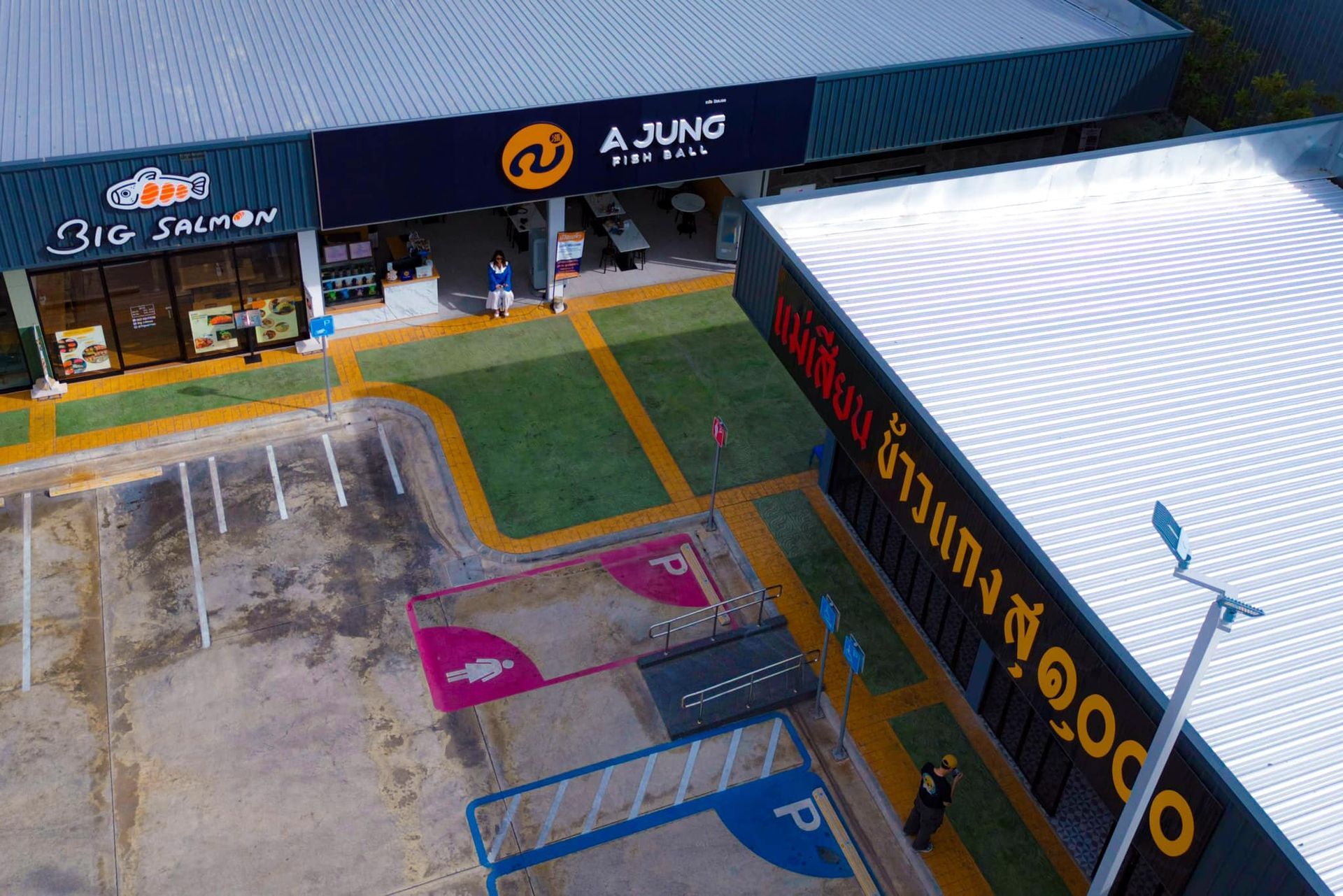 An aerial view of a building with the word 