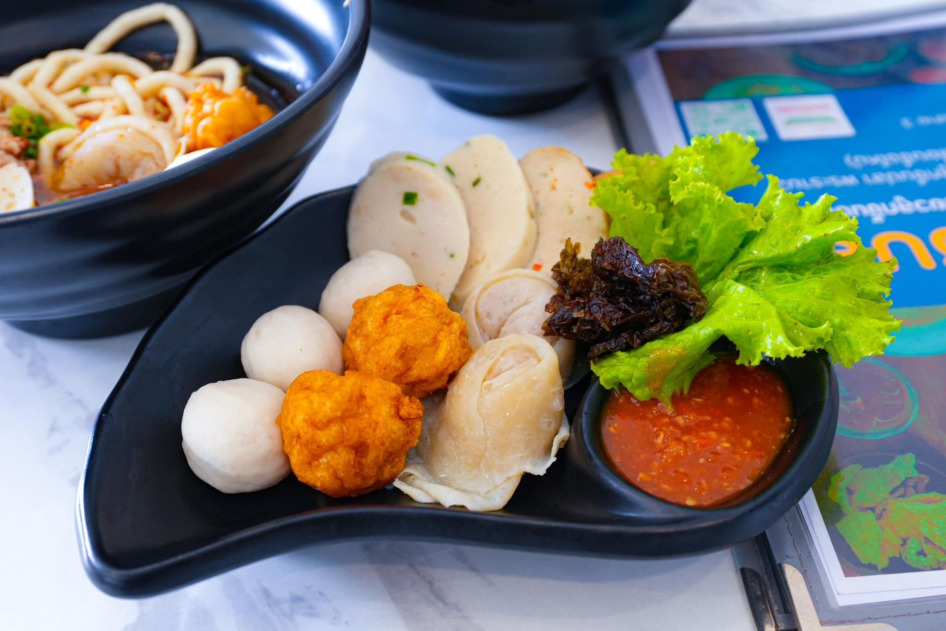 A close up of a plate of food on a table.