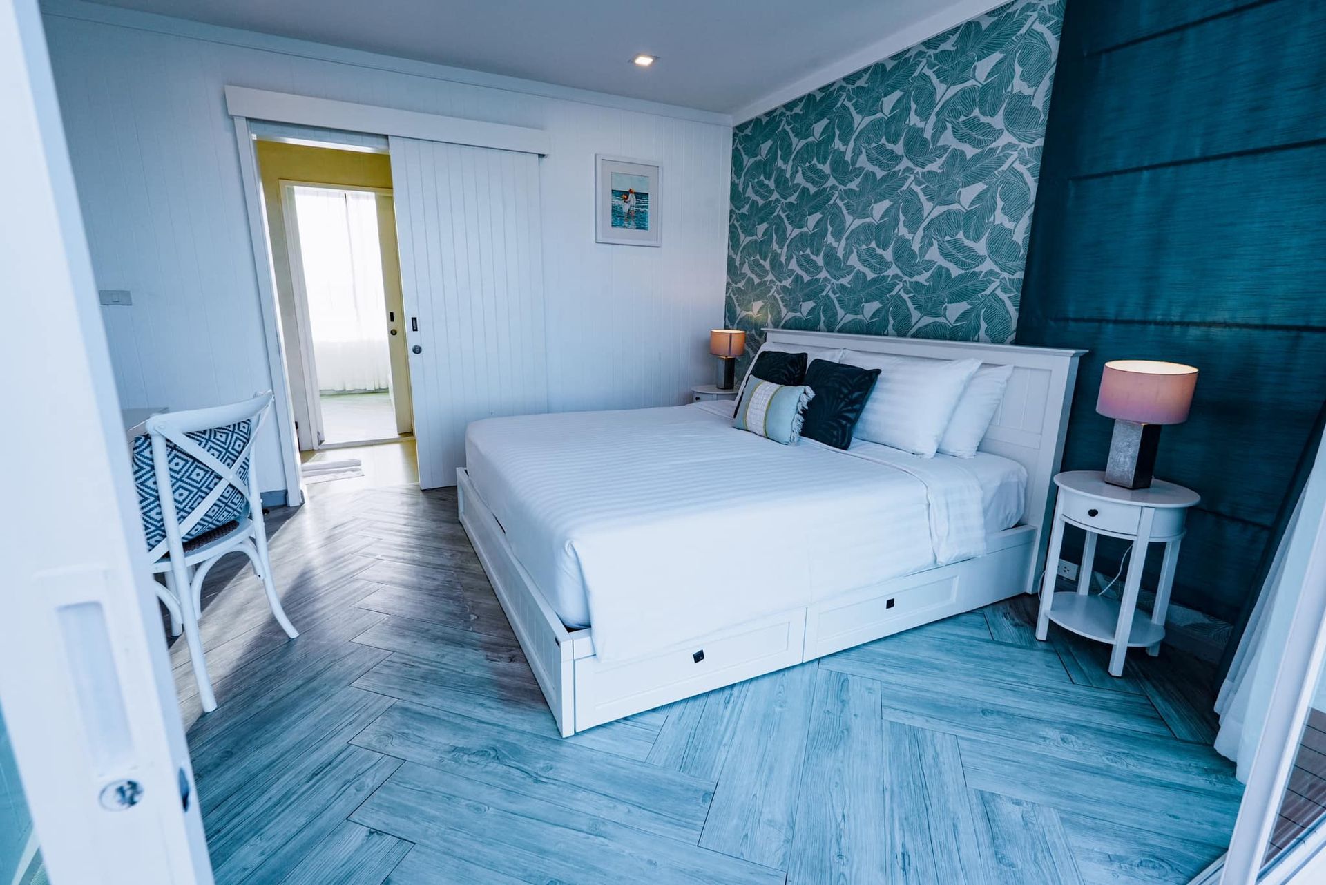 There is a large bed in the middle of the room.
