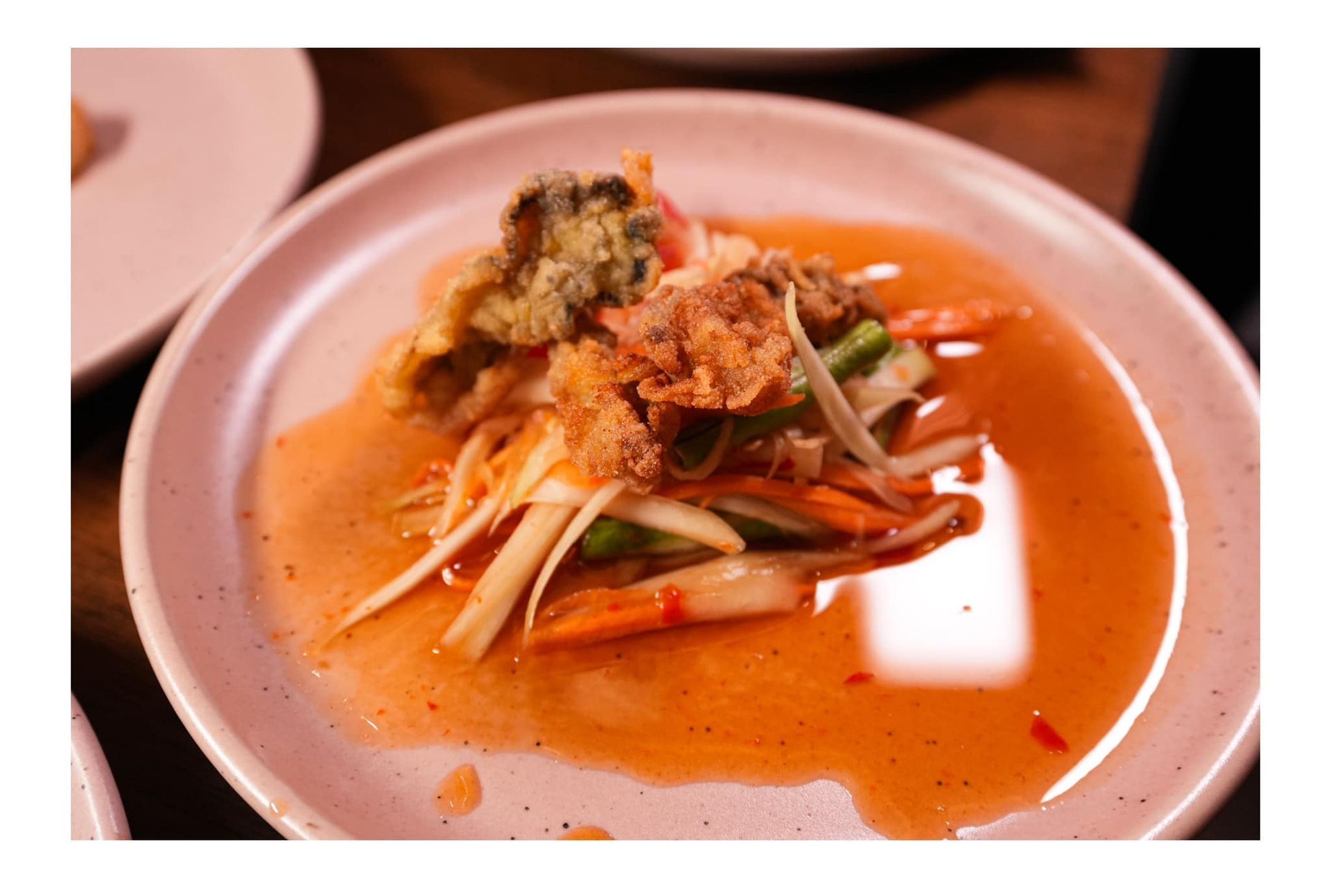 A close up of a plate of food on a table.