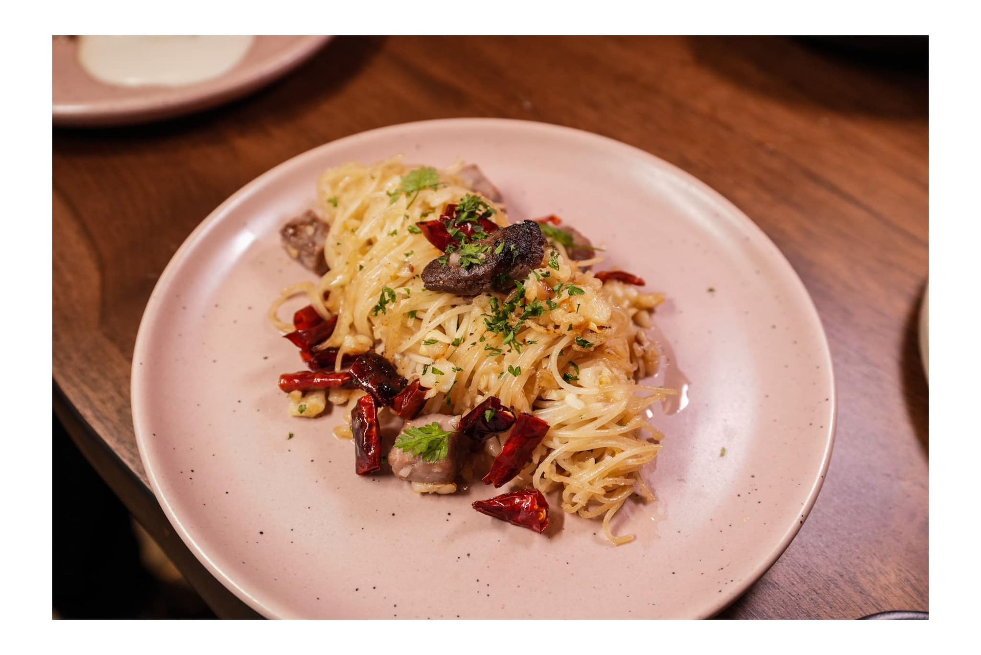 A close up of a plate of food on a table  at Atrium Restaurant.
