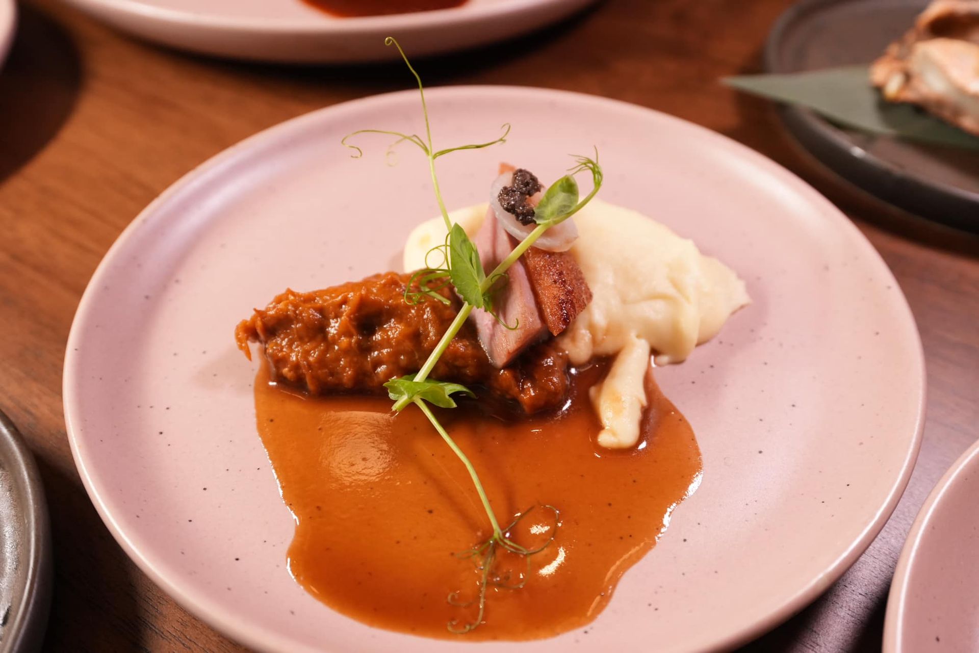 A close up of a plate of food on a table  at Atrium Restaurant.