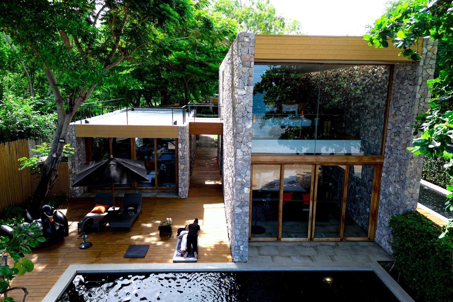 A modern house with a swimming pool in the backyard