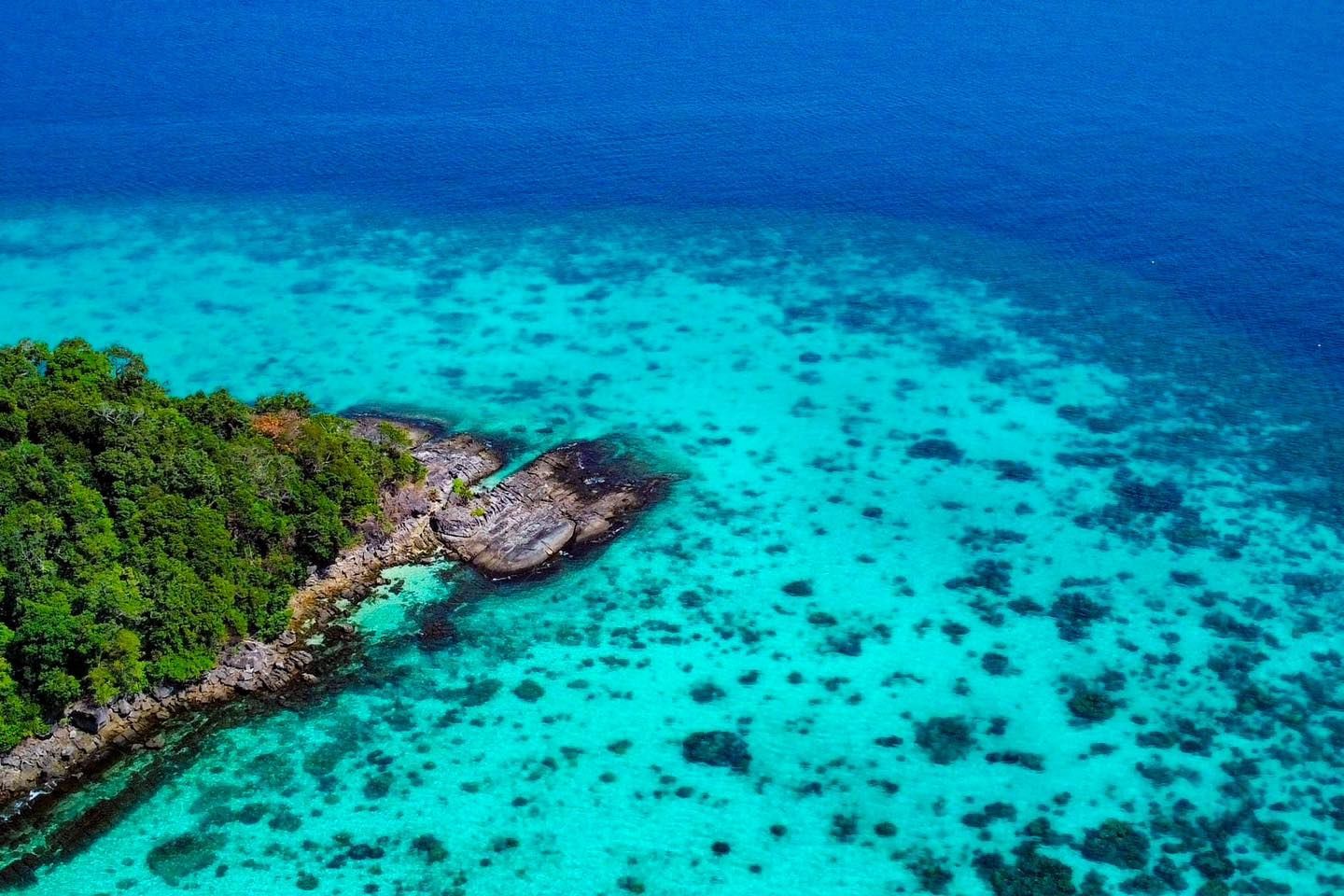 An aerial view of a small island in the middle of the ocean, Surin Islands