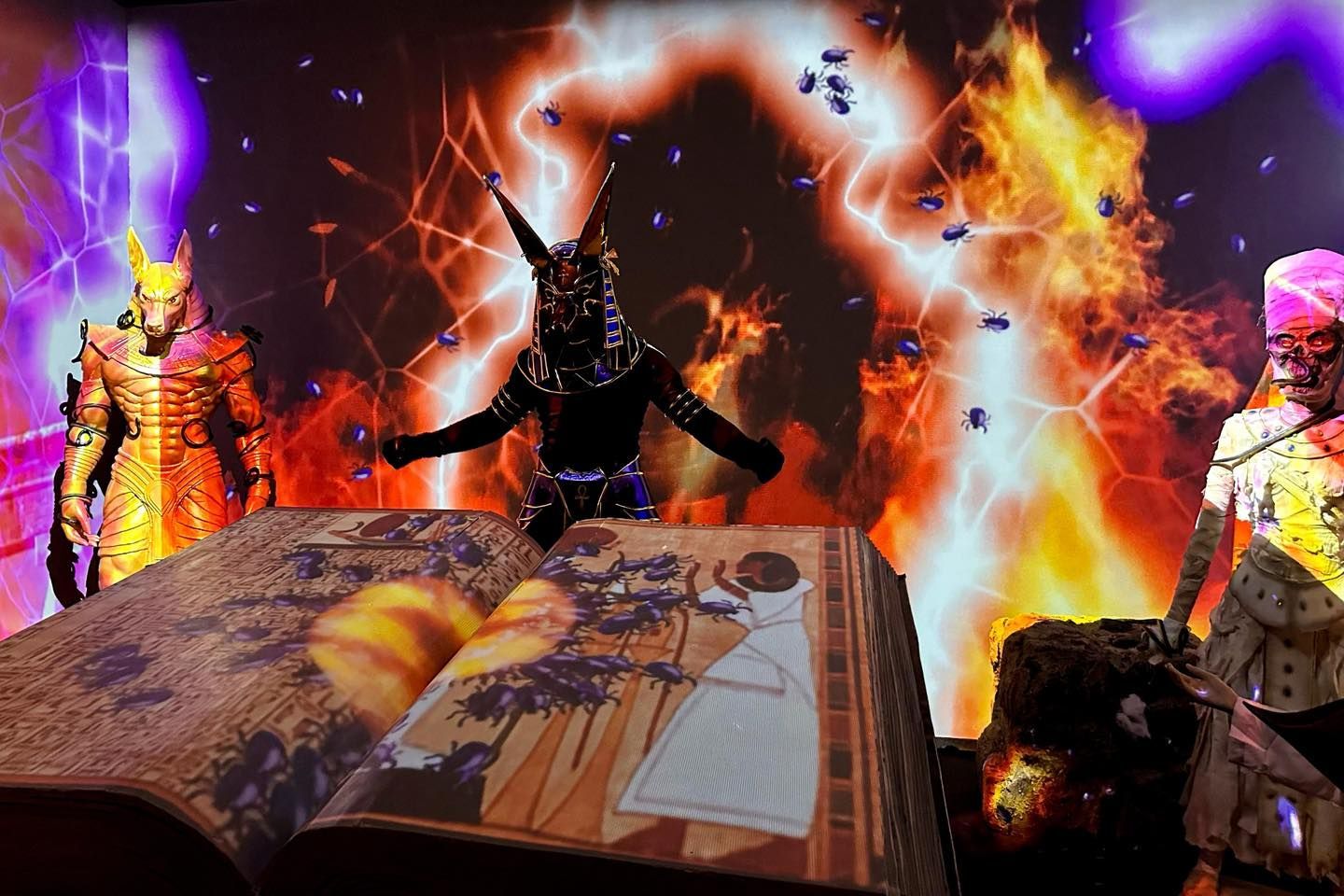 A demon is standing on top of an open book in The Lost Pyramid.