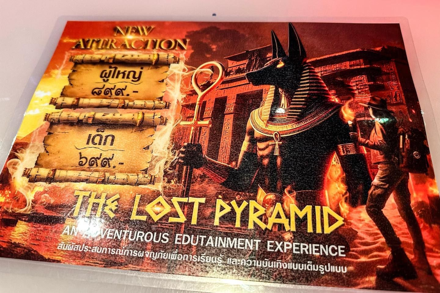 A poster for the lost pyramid shows a man carrying a pyramid