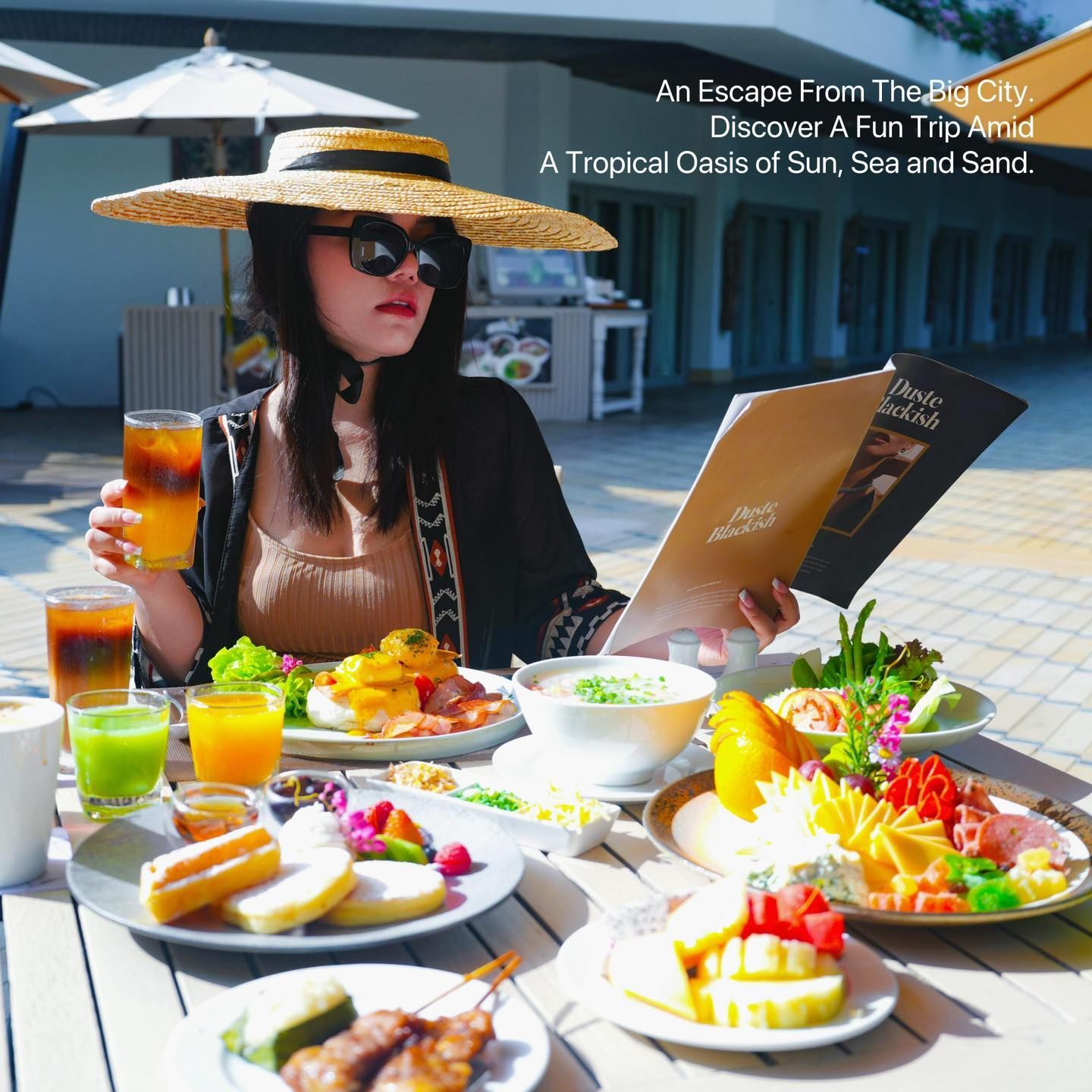 A woman in a straw hat is sitting at a table with plates of food in Avani Restaurant.