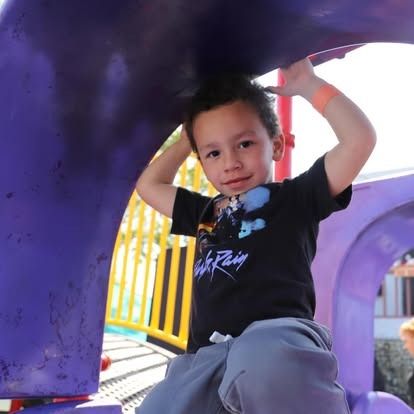 A child in a black 