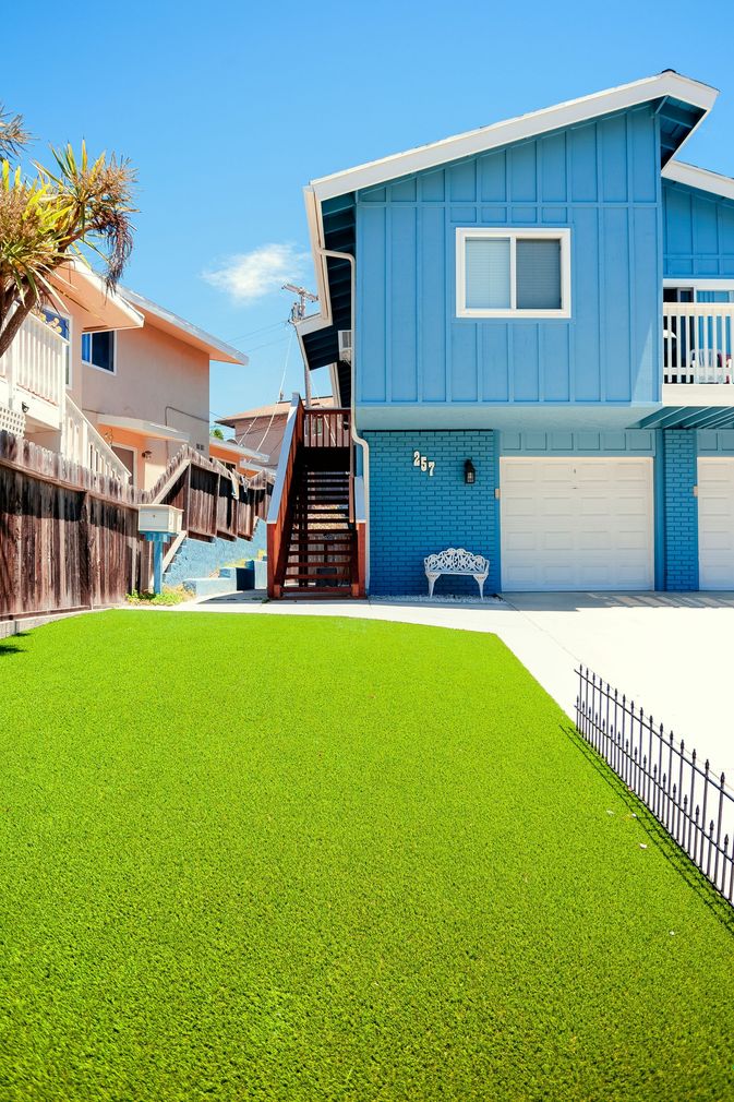 Lush, well-maintained artificial grass in a residential garden.