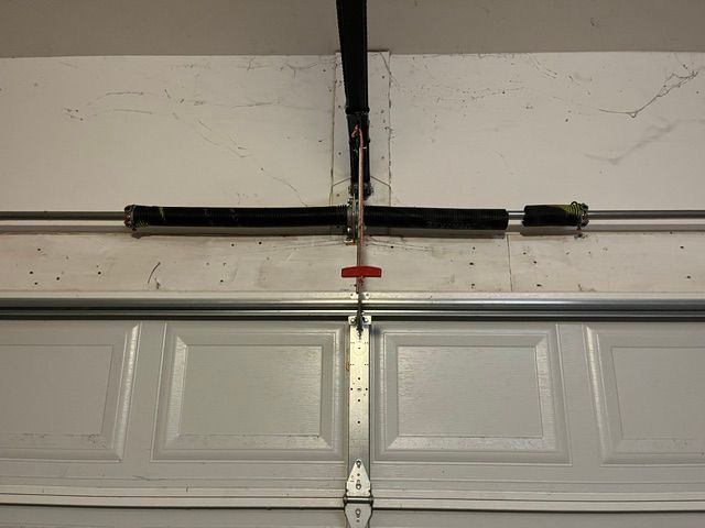 Broken torsion spring replacement in Huntersville