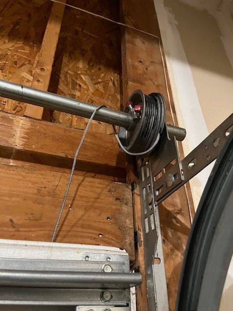 Brown carriage style garage door installation